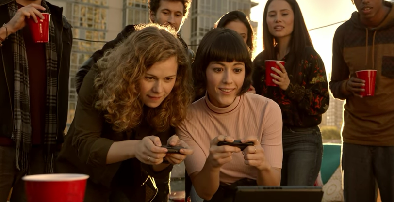 Attractive people enjoying the Switch outside